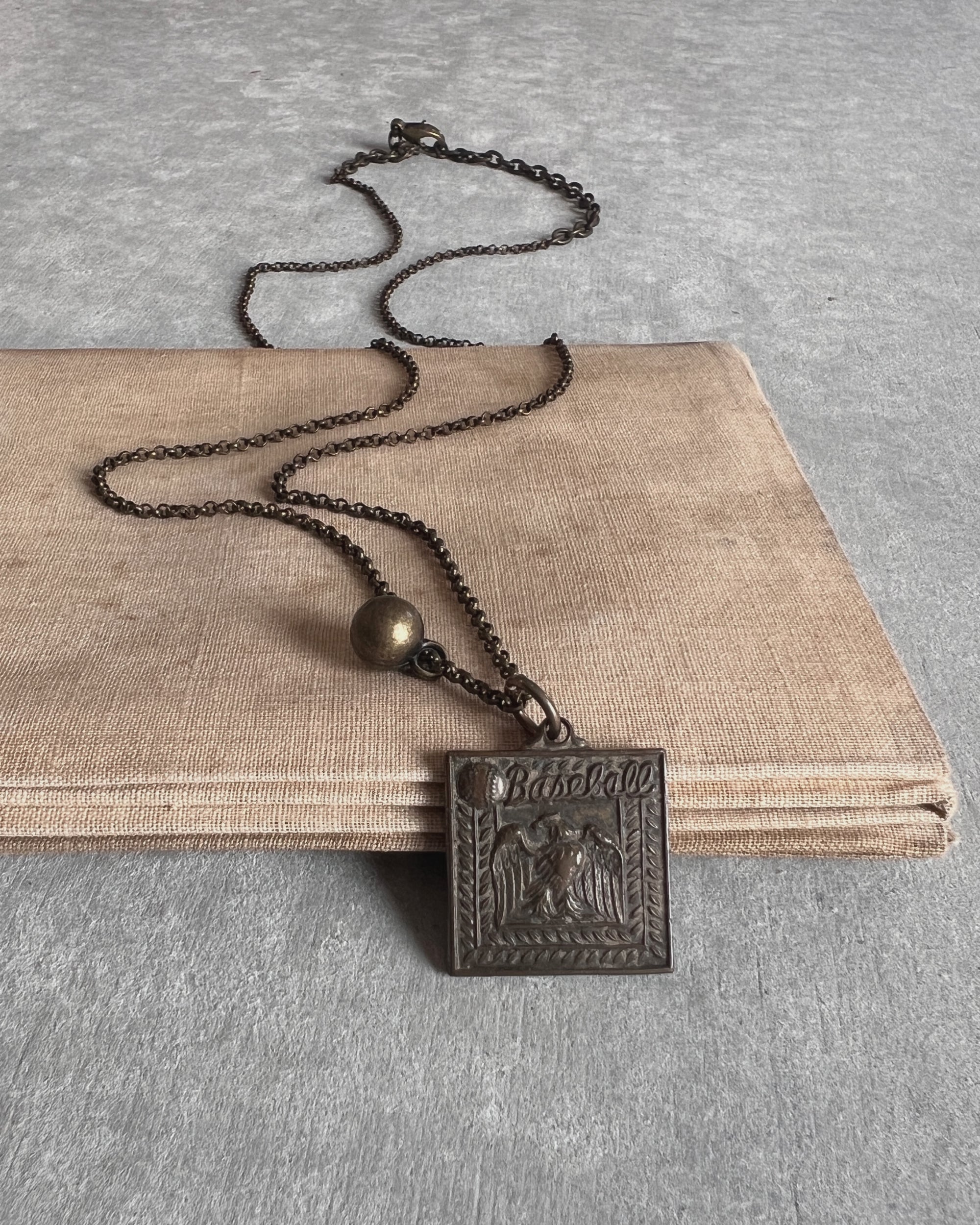 modern marcel : vintage sport medallion necklace